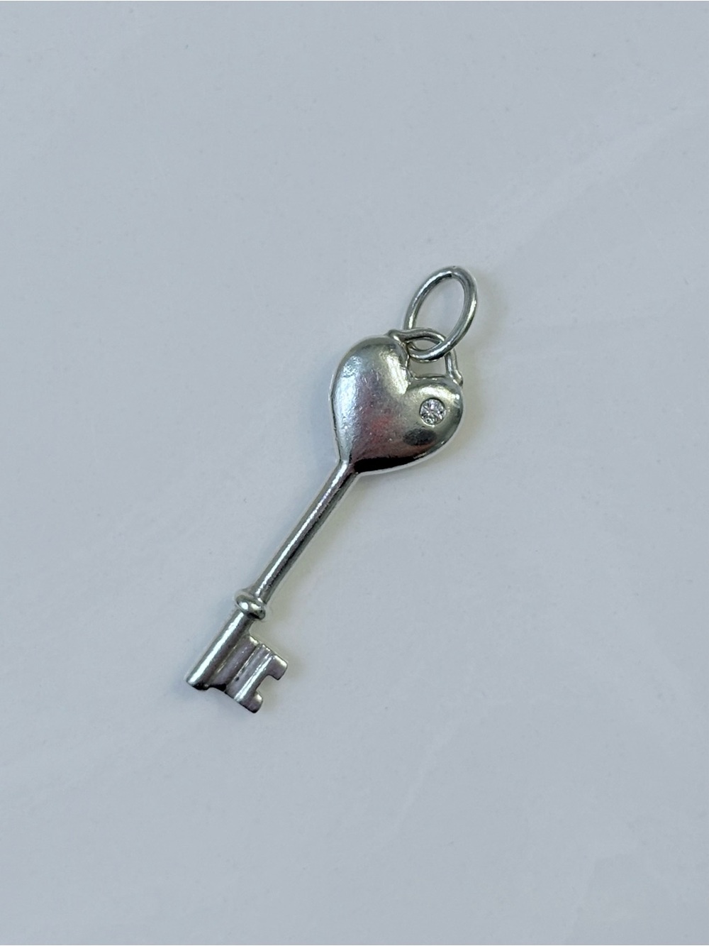 Tiffany & Co. Sterling Silver Key Heart charm pendant with Diamond